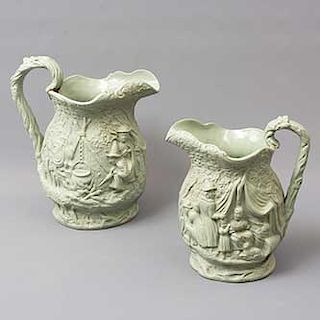 Lote de 2 jarras. Inglaterra. Fechadas 1842. Elaborados en cerámica. Acabado gress. Decoradas con escenas campiranas. 25 x 15 x 25 cm.
