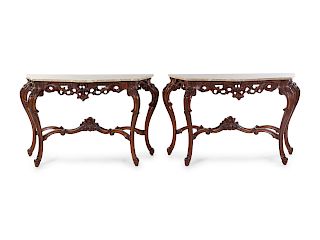 A Pair of Louis XV Style Carved Walnut Console Tables