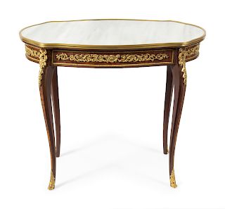 A Louis XV Style Gilt Bronze Mounted Table