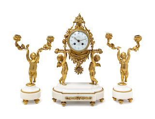 A Louis XVI Gilt Bronze and Marble Three-Piece Clock Garniture