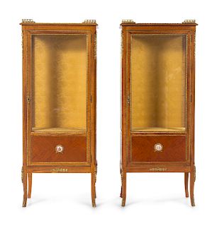 A Pair of Louis XVI Style Gilt Metal and Porcelain Mounted Vitrine Cabinets