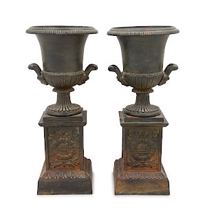 A Pair of French Cast Iron Urns