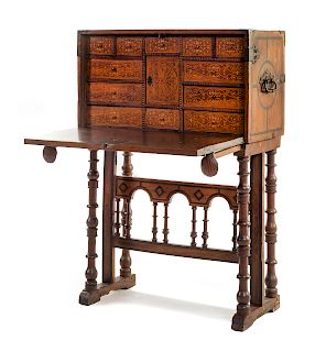 A Spanish Carved and Inlaid Walnut Vargueno 