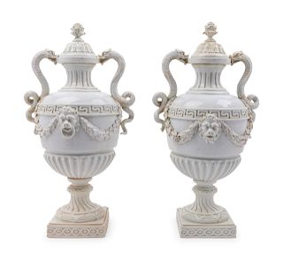A Pair of German Blanc-de-Chine Porcelain Urns