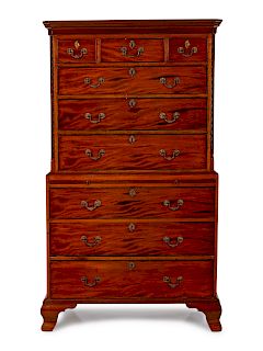 A George III Carved and Figured Mahogany Chest on Chest