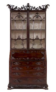 A George III Carved Mahogany Slant-Front Secretary Bookcase