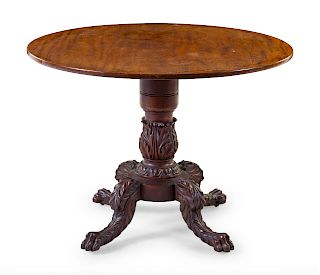 An English Carved Oak Tilt-Top Tea Table