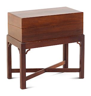 A Chippendale Figured Mahogany and Satinwood Lap Desk on Stand