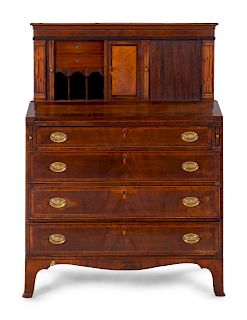 A Federal Inlaid and Figured Mahogany Lady's Tambour Writing Desk