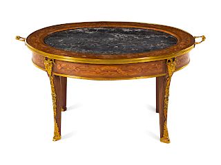 A Louis XVI Style Gilt Metal Mounted Marquetry Low Table
