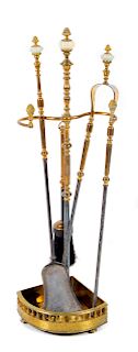 A Set of French Gilt Bronze and Onyx Mounted Fireplace Tools