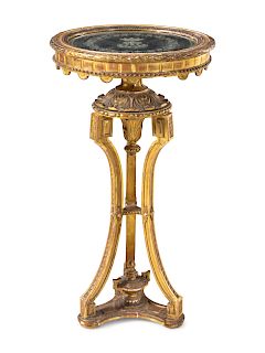 A Neoclassical Giltwood Pedestal
Height 37 1/2 x diameter 20 inches.