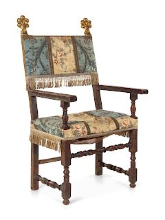 A Spanish or Italian Baroque Walnut and Giltwood Armchair
Height 46 inches.