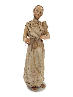 A Continental Painted Figure of a Saint