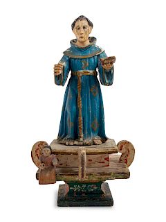 A Continental Painted Figure of a Saint