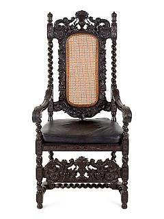 A Renaissance Revival Carved Mahogany Armchair
Height 53 3/4 inches.
