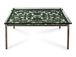 A Wrought Iron Grate Mounted as a Low Table