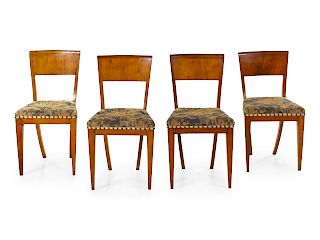 A Set of Four Biedermeier Birch Dining Chairs
Height 34 inches. 