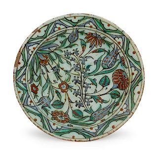 An Iznik Pottery Charger
Diameter 11 1/2 inches.