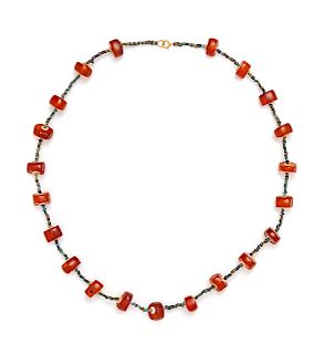 An Egyptian Amber and Faience Beaded Necklace