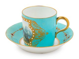 A Sevres Style "Jeweled" Porcelain Cup and Saucer