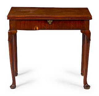 A George III Mahogany Flip-Top Table
Height 28 x width 30 x depth 14 1/2 inches.