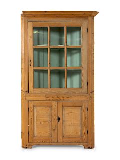 An American Pine Corner Cabinet
Height 79 inches.