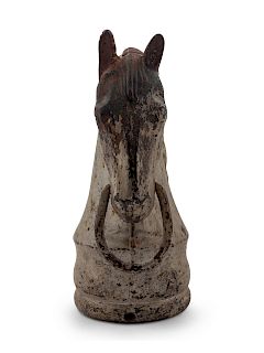 A Cast Iron Horsehead Hitching Post