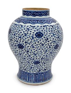 A Large Chinese Blue and White Porcelain Jar
Height 14 inches.