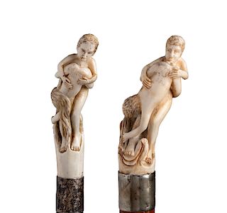 A pair of antique bone mounted erotic walking stick canes - London 1922 & early 20th Century