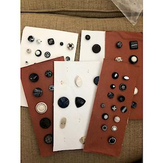 6 CARDS OF MOSTLY BLACK AND WHITE GLASS BUTTONS