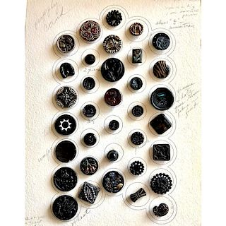 1 CARD OF ASSORTED BLACK GLASS PICTORIAL BUTTONS