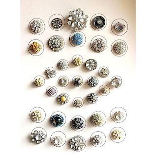 SEVERAL CARDS OF PASTE JEWEL BUTTONS IN VARIOUS SIZES