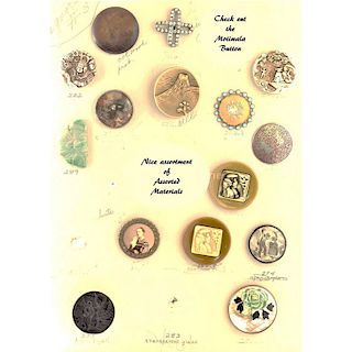 PARTIAL CARD OF LARGE ASSORTED MATERIAL BUTTONS
