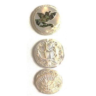 3 CARVED BETHLEHEM PEARL BUTTONS INCL.AN ABALONE INLAY