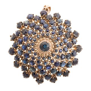 A Ladies Vintage Sapphire Pendant/Brooch in 14K