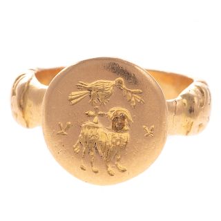 An 18K Yellow Gold Heavy Crest Ring