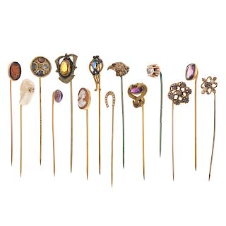 A Collection of Vintage Stick Pins in Gold