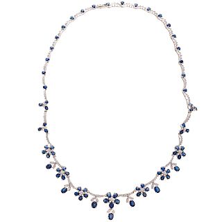 A Ladies Sapphire & Diamond Floral Necklace in 14K