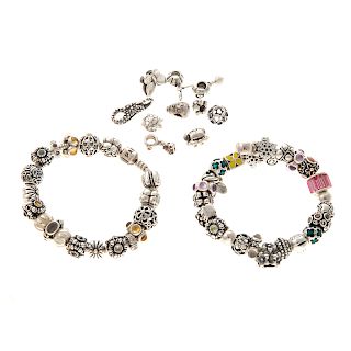 A Pair of Sterling Pandora & Chamilia Bracelets