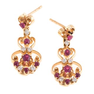 A Pair of Ruby & Diamond Dangle Earrings in 14K