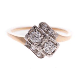 A Ladies Diamond Bypass Ring in 14K