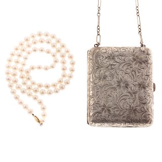 A Strand of Pearls & Silver Engraved Wrist Purse