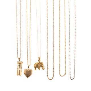 A Collection of Gold Chains and Charms