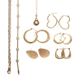 A Collection of Ladies Gold Jewelry in 18K & 14K