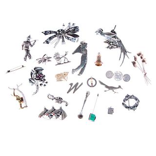 Collection of silver and metal jewelry and objects