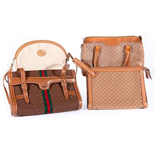 Collection of 4 Gucci leather & canvas handbags