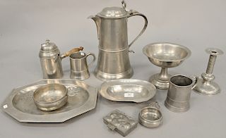 Pewter lot including large beaker, compote, plates and mugs, candlesticks.