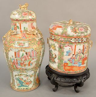 Two Rose Medallion covered jars, China, mid 19th century, one cylindrical, the other domed lidded baluster shape, both with applied gilt serpentine qi