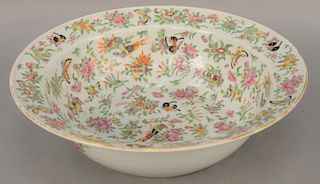 Large Famille Rose basin, China, first half of 19th century, decorated with butterflies and flowers. diameter 16 inches. Provenance: A South Eastern M